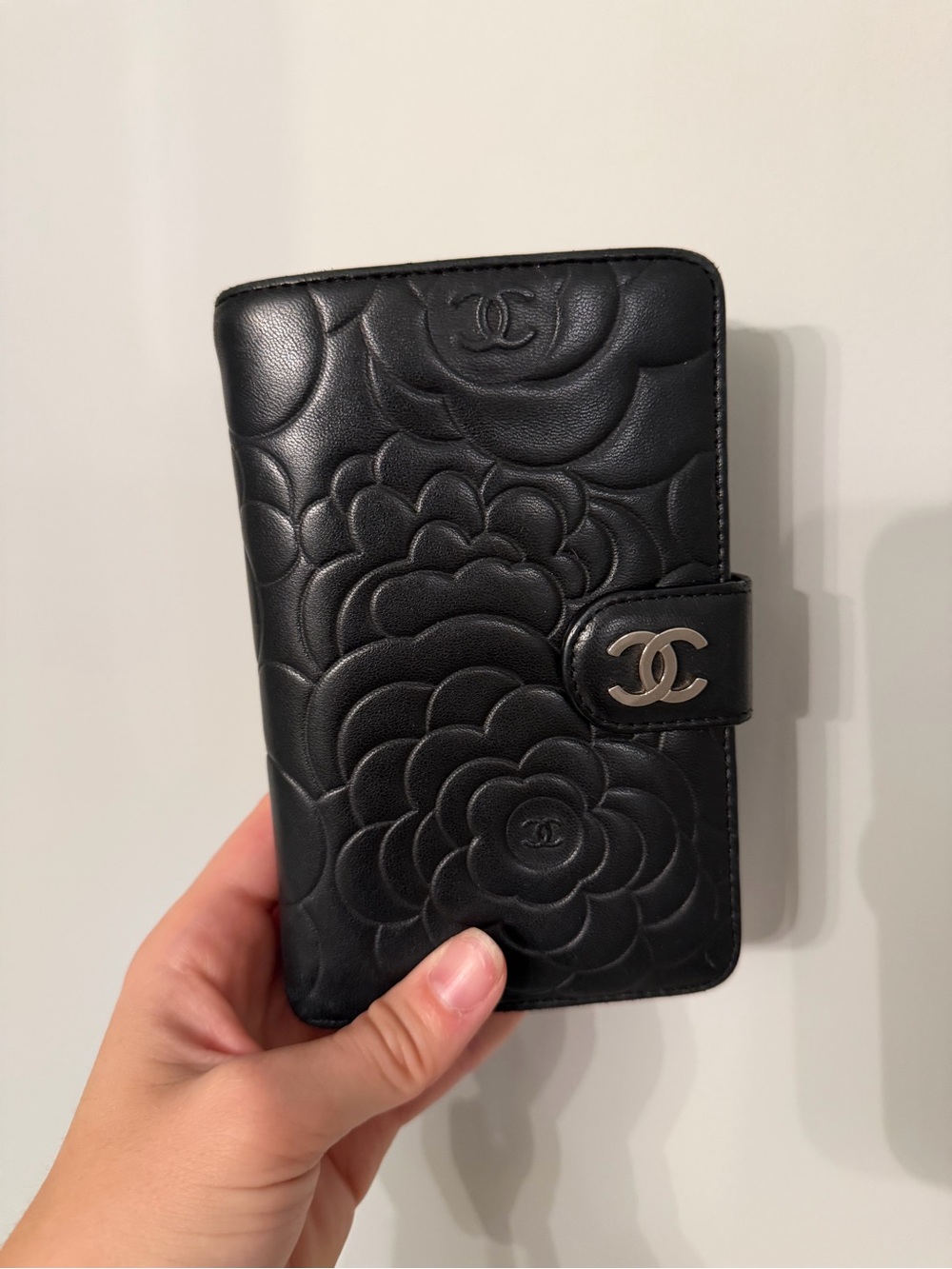 CHANEL Black Quilted Camellia Leather Phone Wallet with CC Clasp